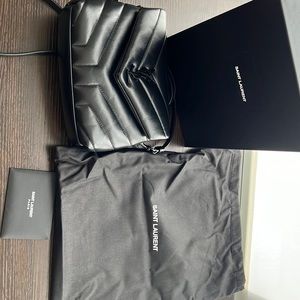 YSL mini bag. Black leather. Box and certificate of authenticity included.